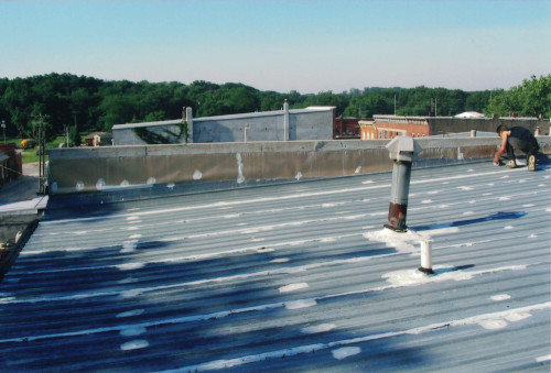 Before photo of issues on the local Iowan grocery store's roof.