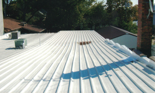 Photo of the the lower roof, half coated.
