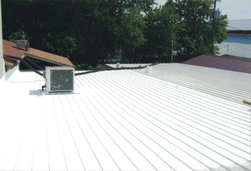 Another after photo of a fresh, clean roof for a small town grocer.
